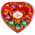 Heart shaped red gift box filled with assorted foil wrapped chocolates and a Felici label in the center   Mayorista AhorroPlus